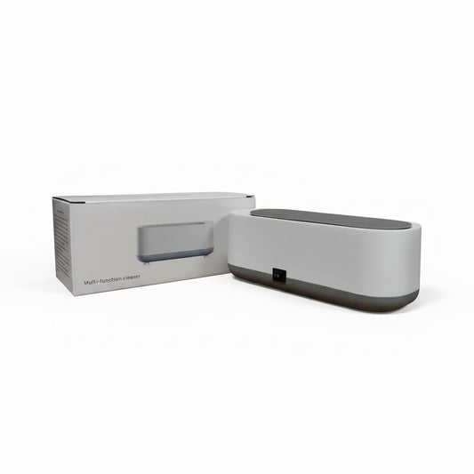 ultrasonic cleaning machine for jewelry and eyeglasses, vibratory agitation, battery operated